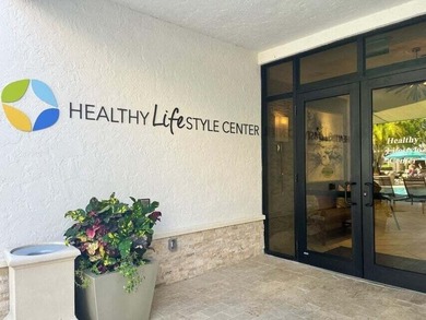 his impeccably maintained 2-bedroom, 2-bathroom condo offers a