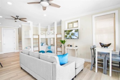 This LUXURIOUS BEACHFRONT smart home has it ALL! Three stories