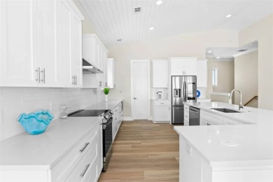 This LUXURIOUS BEACHFRONT smart home has it ALL! Three stories