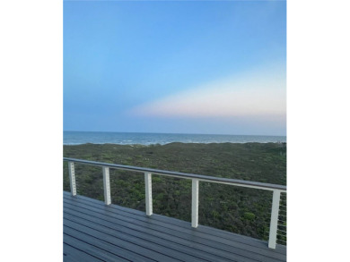 This LUXURIOUS BEACHFRONT smart home has it ALL! Three stories