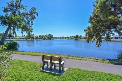 WELCOME TO YOUR NEW WATERFRONT OASIS! This lovely single-level