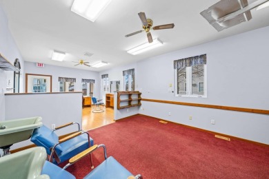 This commercial real estate property comprises a three-unit