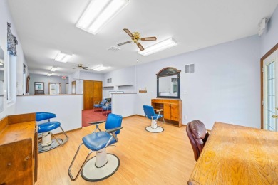 This commercial real estate property comprises a three-unit