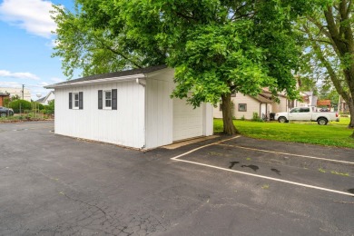 This commercial real estate property comprises a three-unit