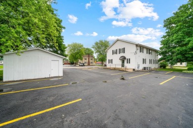 This commercial real estate property comprises a three-unit