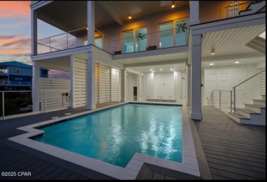 A SHOWSTOPPER of a home! Located in Secluded Dunes subd. This