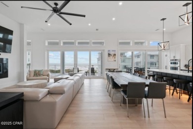 A SHOWSTOPPER of a home! Located in Secluded Dunes subd. This