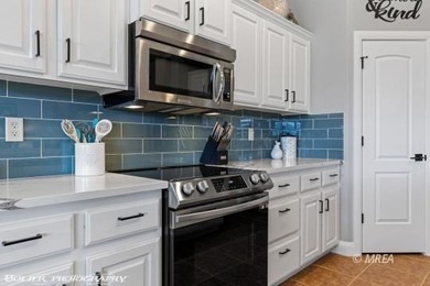 Welcome to 697 Cinco Ct, a beautifully updated home perfectly