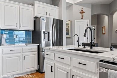 Welcome to 697 Cinco Ct, a beautifully updated home perfectly