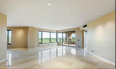 MOTIVATED SELLER! Experience sophisticated high-rise living at