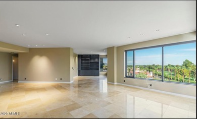 MOTIVATED SELLER! Experience sophisticated high-rise living at