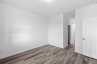 This 4-bedroom, 2-bathroom home, newly built in 2023, offers a