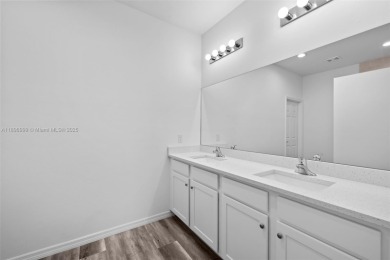 This 4-bedroom, 2-bathroom home, newly built in 2023, offers a