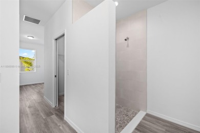 This 4-bedroom, 2-bathroom home, newly built in 2023, offers a