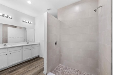 This 4-bedroom, 2-bathroom home, newly built in 2023, offers a