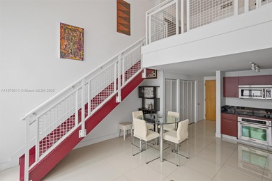 Stylish and spacious bi-level loft-style condo in the exclusive