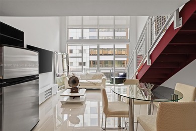 Stylish and spacious bi-level loft-style condo in the exclusive