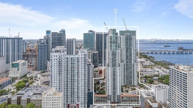 Stylish and spacious bi-level loft-style condo in the exclusive