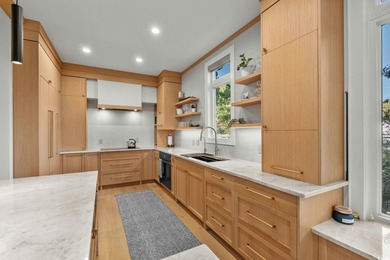 Experience refined coastal living in this private, ocean-view