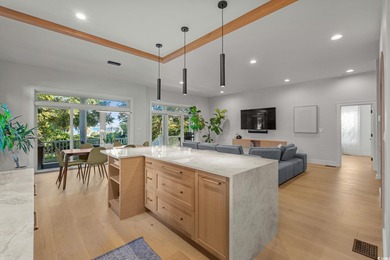 Experience refined coastal living in this private, ocean-view