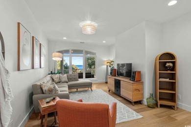 Experience refined coastal living in this private, ocean-view