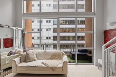 Stylish and spacious bi-level loft-style condo in the exclusive