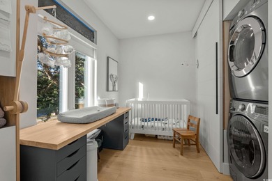 Experience refined coastal living in this private, ocean-view