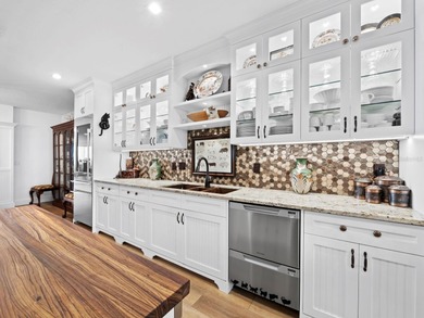 Perfectly positioned on Sarasota Bay at the southern end of