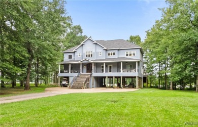 Nestled on the banks of the Black Warrior River, this 5 bedroom