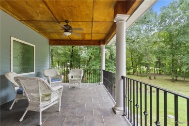 Nestled on the banks of the Black Warrior River, this 5 bedroom