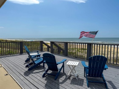 This charming ground level house on St. George Island offers the