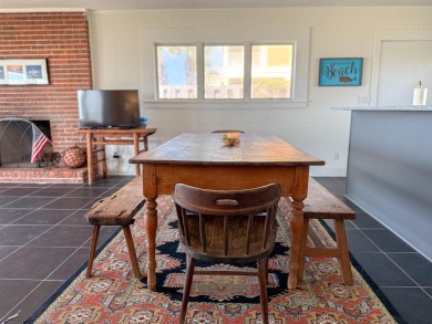 This charming ground level house on St. George Island offers the