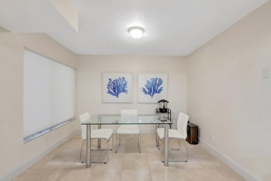 Enjoy the Florida lifestyle in this gorgeous 1st-floor condo in