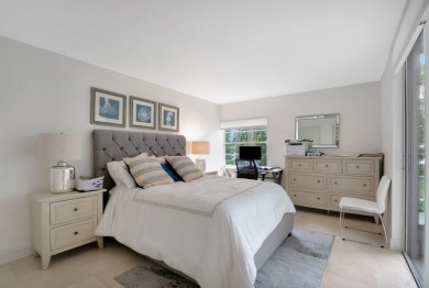 Enjoy the Florida lifestyle in this gorgeous 1st-floor condo in