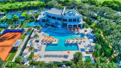 Enjoy the Florida lifestyle in this gorgeous 1st-floor condo in