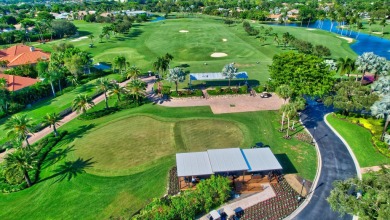 Enjoy the Florida lifestyle in this gorgeous 1st-floor condo in