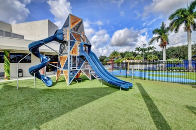 Enjoy the Florida lifestyle in this gorgeous 1st-floor condo in