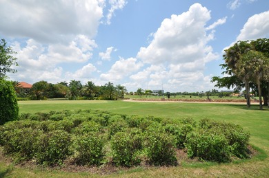 Enjoy the Florida lifestyle in this gorgeous 1st-floor condo in