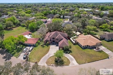 Experience timeless elegance in this spacious 4,205-sq-ft home