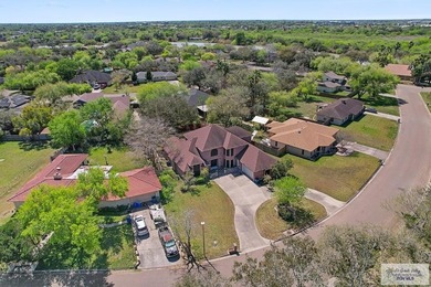 Experience timeless elegance in this spacious 4,205-sq-ft home