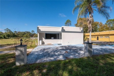 Excellent location! Great stucco retail building divided in 2