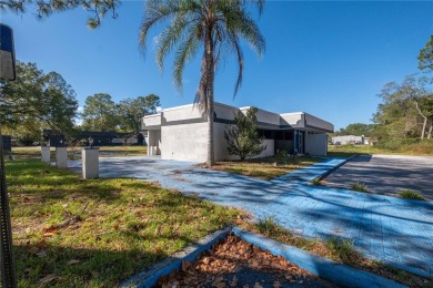 Excellent location! Great stucco retail building divided in 2