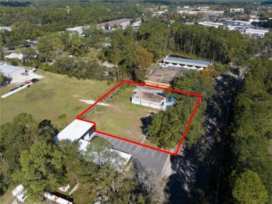 Excellent location! Great stucco retail building divided in 2