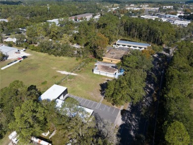 Excellent location! Great stucco retail building divided in 2