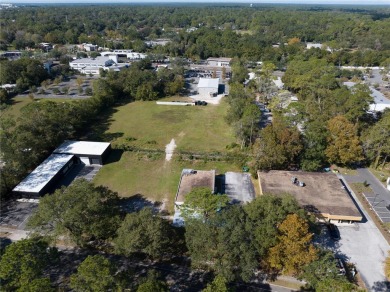 Excellent location! Great stucco retail building divided in 2