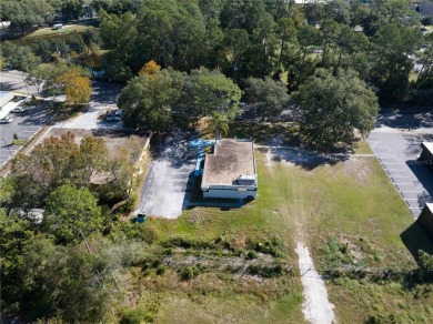 Excellent location! Great stucco retail building divided in 2