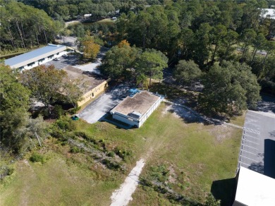 Excellent location! Great stucco retail building divided in 2