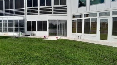 JUST REDUCED!!! YOU CAN'T MISS THIS GORGEOUS 1ST. FLOOR LAKE