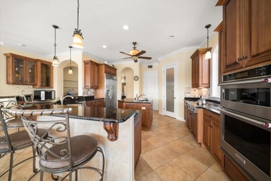 Nestled in the highly coveted Harbor Bluffs community, this