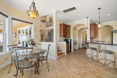 Nestled in the highly coveted Harbor Bluffs community, this